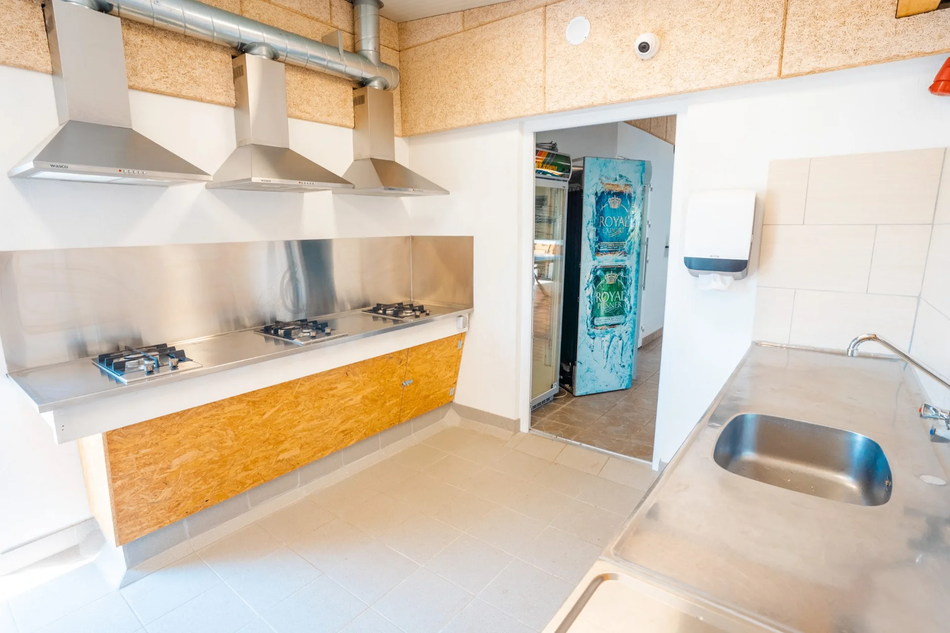Shared kitchen with gas hotplates and extractor hoods